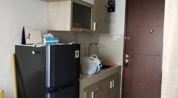 Gambar 1 apartemen SpringWood type Studio di jalan raya Serpong