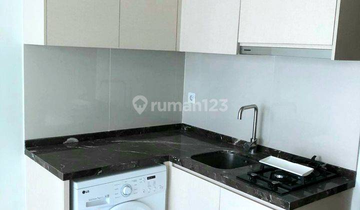 Puri Mansion 2BR Luas 49m² Tower B Lantai Tinggi Standard 2