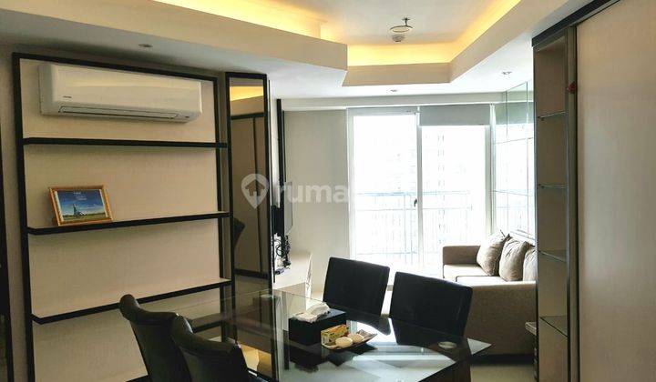 Apartemen The Mansion  2BR Lantai tinggi Furnished 1