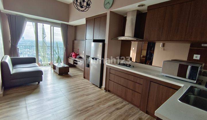 Di sewakan apartemen 2 bed room full furnish di casa de parco bsd 1