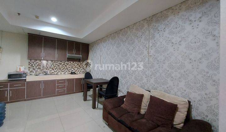 Apartemen trivium 1 br lantai rendah view lake dan swimming pool 1