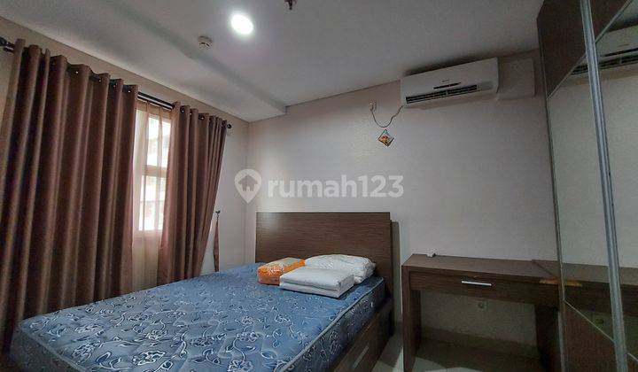 Apartemen trivium 1 br lantai rendah view lake dan swimming pool 2