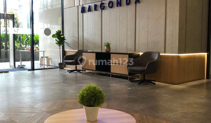 ruang tamu apartemen 1br unfurnished di evenciio