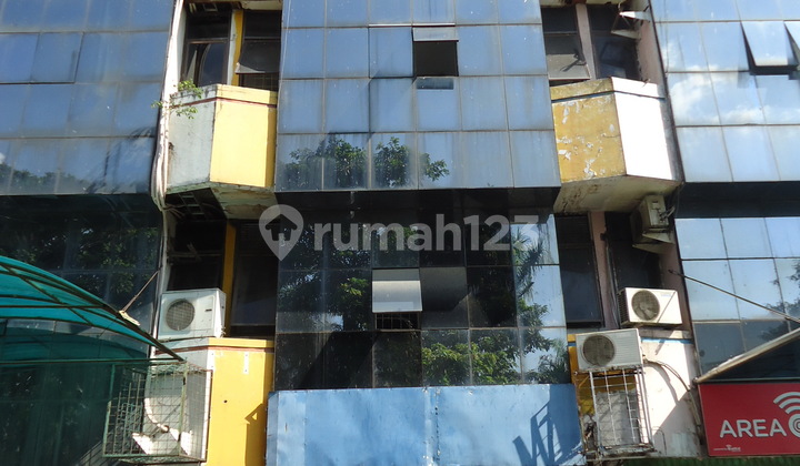 Shop House Within a bustling shop house complex Shop House Within a bustling shop house complex