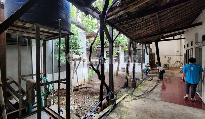 GUDANG DAN RUMAH  SAYAP CARINGAN 