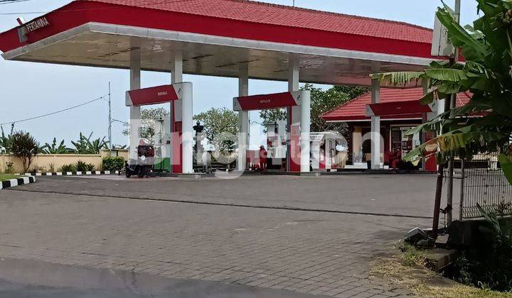 Gilimanuk Bali Denpasar gas station on the side of the highway + letters 1