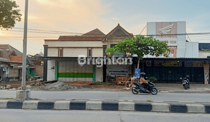 RUMAH EX KANTOR PEGADAIAN WOLTERMONGINSIDI PINGGIR JALAN RAYA HARGA MURAH 1