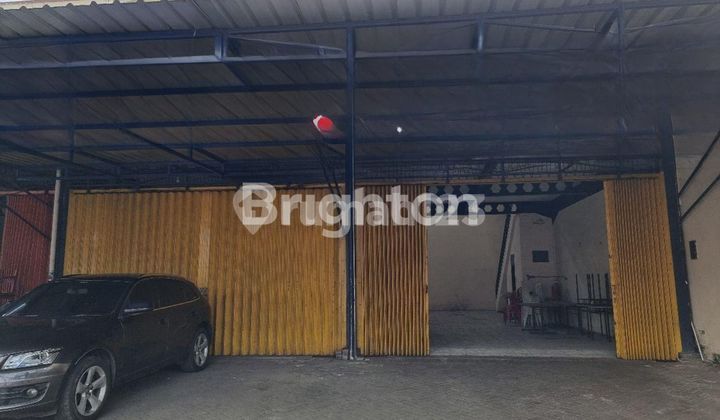 gudang luas di kota dekat araya nol jalan- cukup strategis  kontrainer bisa masuk.