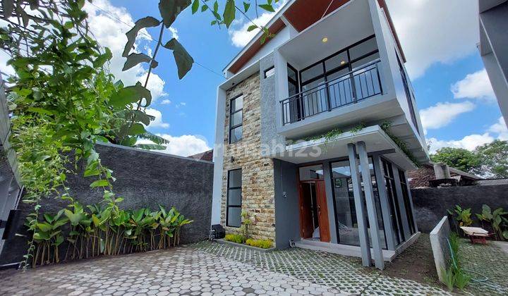 RUMAH BARU DESAIN TROPIS MINIMALIS DI MAGUWOHARJO 2