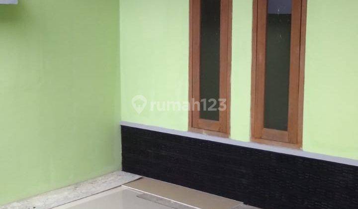 Dijual rumah tinggal di lingkungan asri cluster Koni Residence dekat sawangan (RS)  2