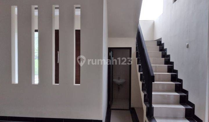 Rumah Modern Minimalis Depan Taman 2