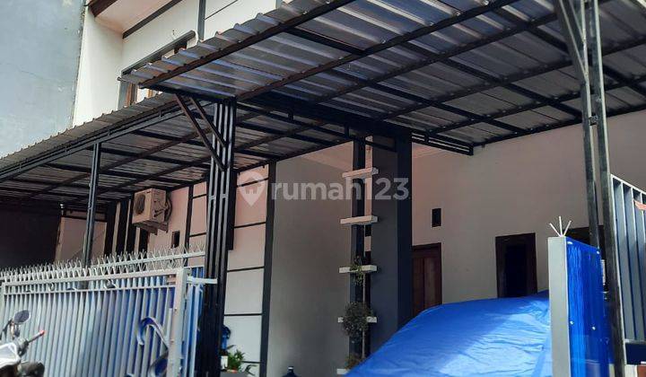 RUMAH DALAM CLUSTER DI CONDONGCATUR 1