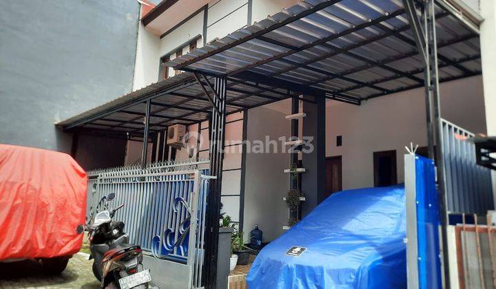 RUMAH DALAM CLUSTER DI CONDONGCATUR 2