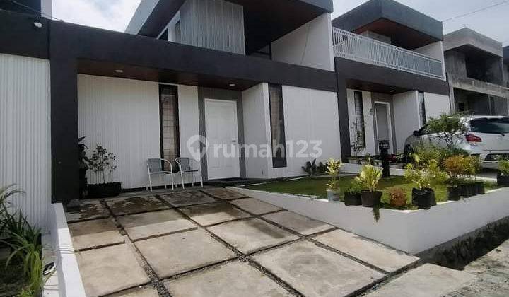 RUMAH DENGAN DESAIN PENCAHAYAAN MATAHARI TERBAIK 1