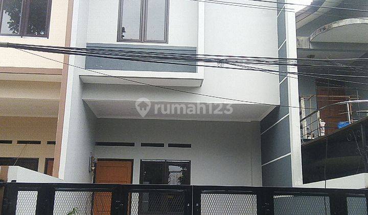 Rumah minimalis bangunan baru di turangga  1