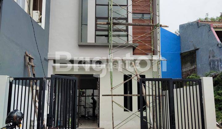 RUMAH BARU DAN GRESS 2 LT DI WIGUNA SELATAN SURABAYA 1