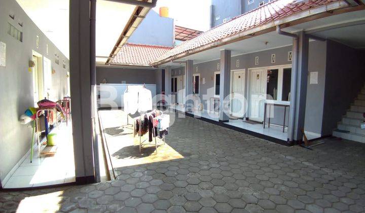 RUMAH KOST DENGAN 14 KAMAR 2