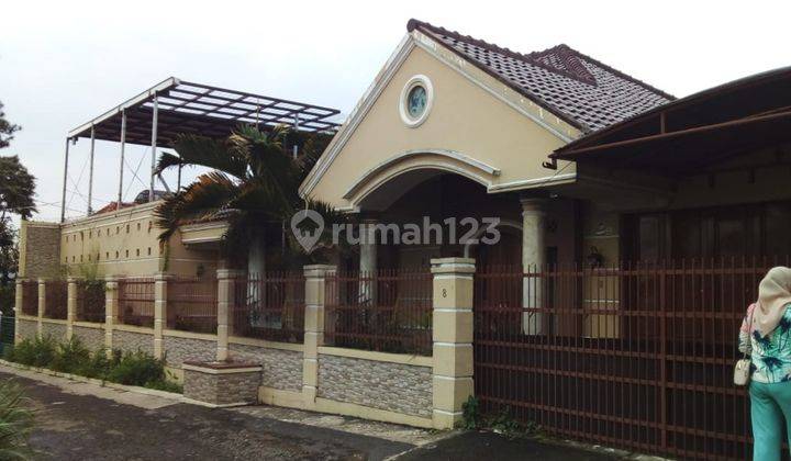 Rumah Dan tempat Usaha Di Jl. Haji Cihanjuang 1