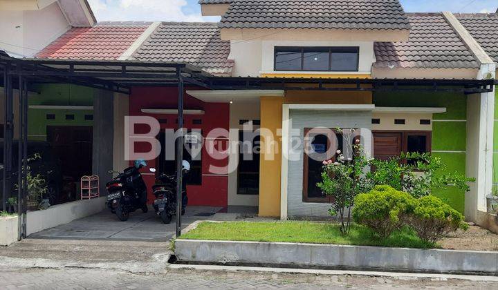 RUMAH MINIMALIS DI PERUMAHAN CLUSTER WIRUN 1