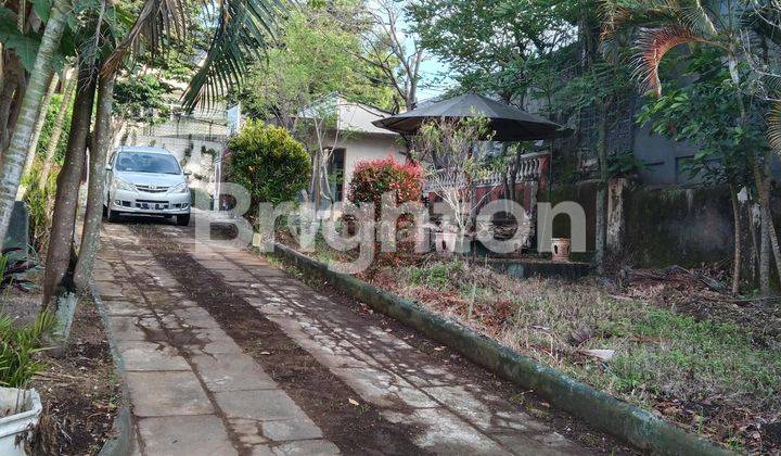 Rumah hitung tanah di pinggir jalan utama Kota Batu 2