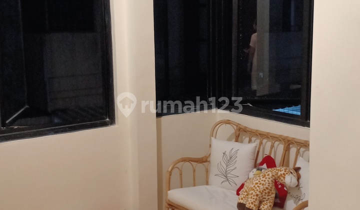 Ready-to-live-in 2-story glass house. 2