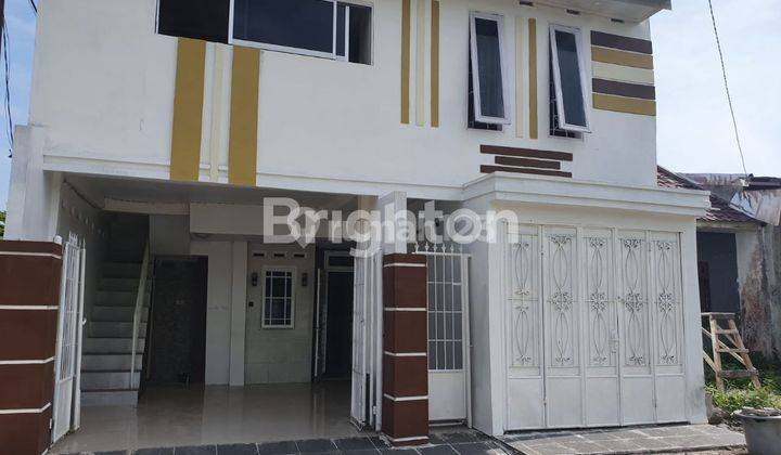 RUMAH 2 TINGKAT MEDAN TUNTUNGAN 1