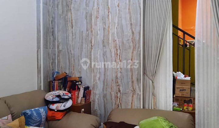 RUMAH DUA LANTAI DENGAN KAMAR TIDUR MEZANIN DI LOKASI STRATEGIS LIPPO CIKARANG 2