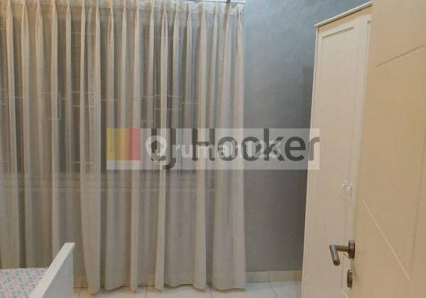 Rumah Furnished dengan Bangunan Modern dalam Cluster di Raffles Hills Cibubur ( LT. 120180 ) 2