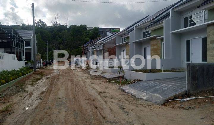 RUMAH MURAH 2 LT   DI PERUMAHAN PESONA KHATULISTIWA 1