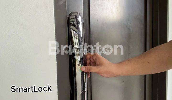 RUMAH DENGAN SMART LOCK DI CITRAGRAND 2