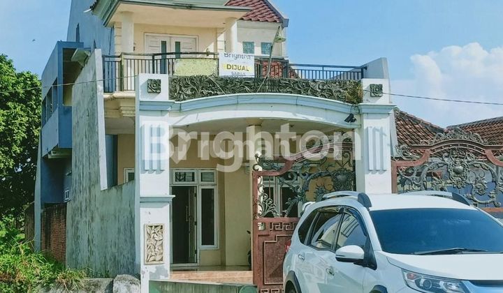 rumah  2 lantai & sisa tanah yg luas second road terawat siap huni SUKODONO