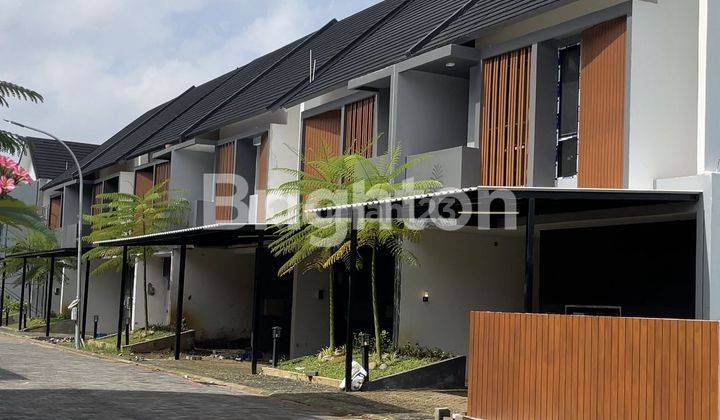 di  rumah baru modern tropis di belakang Hotel Aston basuki rahmat 1