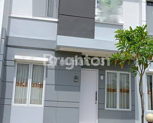 RUMAH CANTIK  DUA LANTAI DIGRAND CITY 2