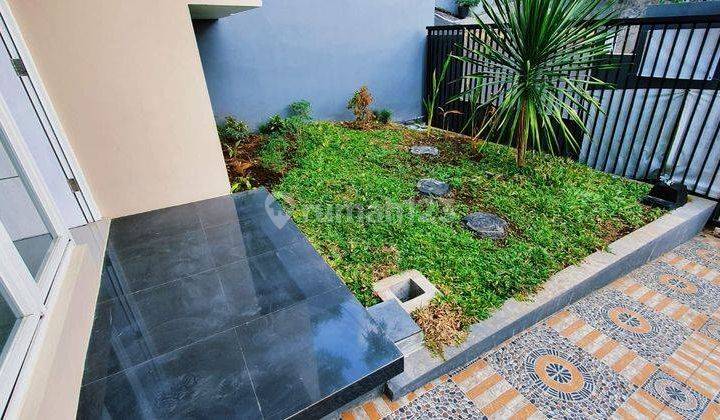 Jual Rumah 2 Lantai SHM Sudah Renovasi di Jalan Sri Rejeki 2