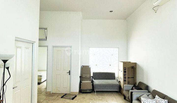 ruang keluarga jual rumah di erfina kencana