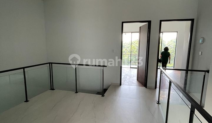 Rumah Minimalis Mekarwangi Smart Home Taman Belakang 2