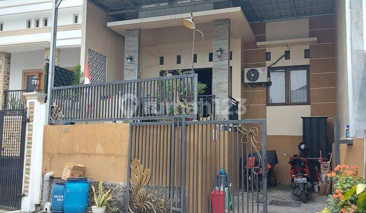 tampak depan rumah siap huni di perumahan