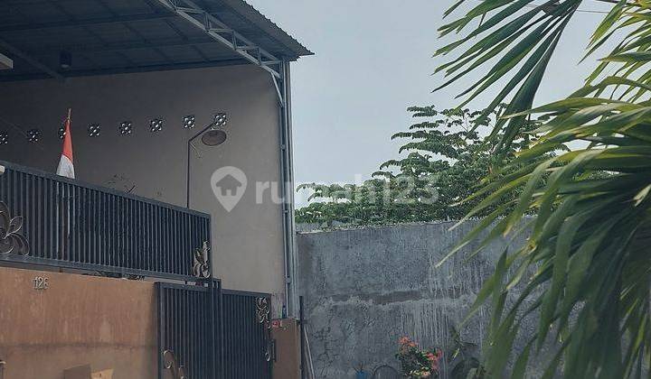 tampak depan rumah siap huni di perumahan