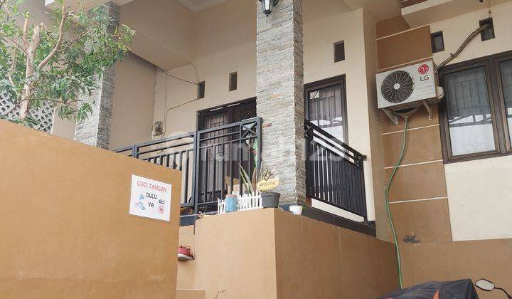tampak depan rumah siap huni di perumahan