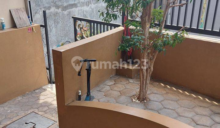 tampak depan rumah siap huni di perumahan