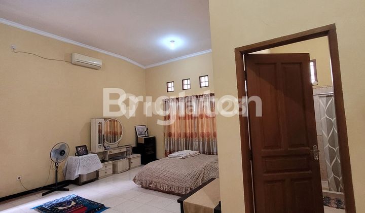 LUXURY HOUSE WITH A SPACIOUS, LUSH, AND COMFORTABLE YARD, STRATEGICALLY LOCATED IN DEPOK NEAR MRT.