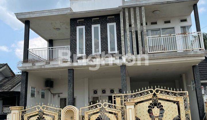 RUMAH CANTIK SIAP HUNI DI KOMPLEK GRAHA KENCANA KALIDONI 1