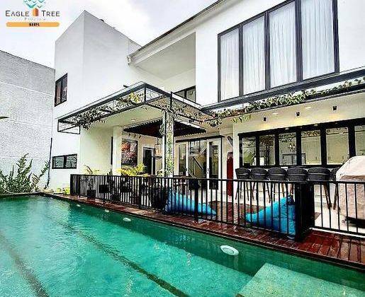 Rumah Modern Tropical Lengkap Dengan Swimming Pool 1