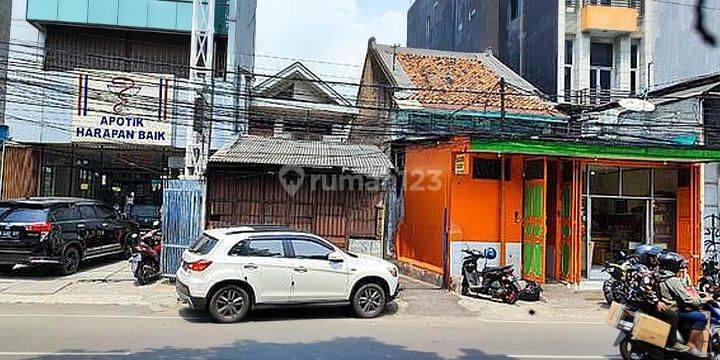 Harga dibawah njop Rumah lama pinggir jalan raya 2