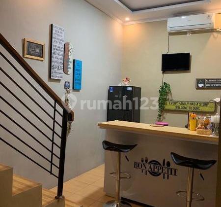 ruang makan rumah siap huni di alamanda