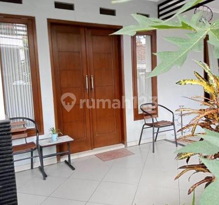 Rumah Di semi furnished di simpang grajakan pandanwangi blimbing