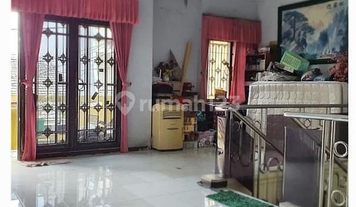 The second house is still in good condition and well-maintained in Tomang. 1