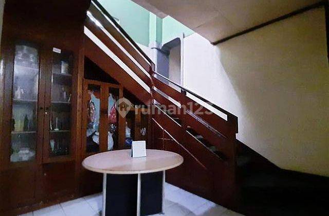 Rumah lama siap huni di komplek PWI Cipinang 2