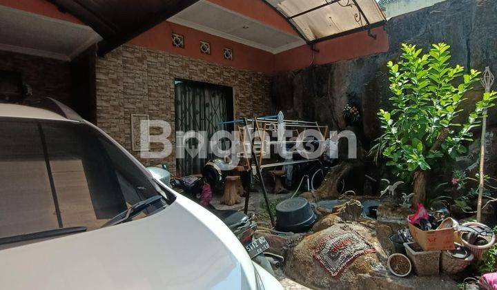 RUMAH 1,5 LANTAI DI SOLO BARU DEKAT THE PARK SOLO ROW  2 MOBIL PADAT PENDUDUK 1