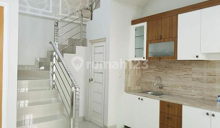 Rarely available new house in Poris Indah at a low price. 2